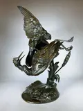 Faucon attaquant un héron by Paul Comolera, Epreuve en bronze à patine brun nuancé, sold Feb 2021