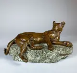 Lionne couchée by Charles Valton, Epreuve en bronze à patine brun-rouge nuancé, sold Feb 2021