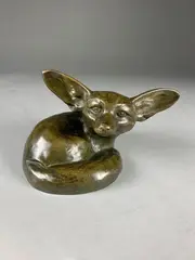 Fennec couché tête levée (taille 1) by Édouard-Marcel Sandoz, Epreuve en bronze à belle patine brun richement nuancé, sold Feb 2021