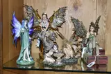 of fairies in woodland settings, with a crystal ball, and with by Five Nemesis Now Resin Figures, sculpture, sold Jun 2023