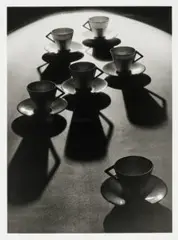 Teacup ballet by Olive Cotton, 1936, printed 1999, silver gelatin photograph, sold Oct 2025
