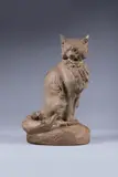 Chat assis by Thomas François Cartier, Épreuve en terre cuite signée sur la terrasse, sold Nov 2024
