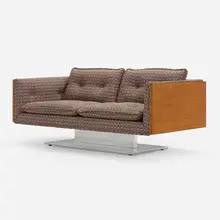 Sofa by Warren Platner, c. 1970, teak, polished aluminum, upholstery, sold Mar 2023