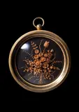 A micro-wood carving of flowers by Giuseppe Maria Bonzanigo, Carved wood, glazed circular gilt-bronze frame, unsigned, sold Oct 2024