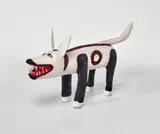Ku’Patch (camp dog) by Roderick Yunkaporta, 2019, natural earth pigments on carved wood, sold Dec 2025