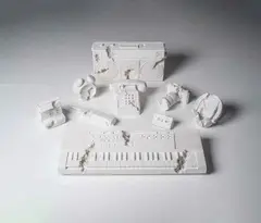 Future Relics, Complete Excavation Set of Nine, 2013-18 by Daniel Arsham, Plâtre et fragment de verre Plaster with glass fragments Mobile Phone (Future Relic FR-01), sold Oct 2019