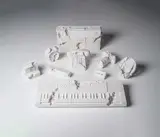 Future Relics, Complete Excavation Set of Nine, 2013-18 by Daniel Arsham, Plâtre et fragment de verre Plaster with glass fragments Mobile Phone (Future Relic FR-01), sold Oct 2019