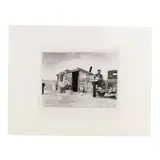 Migratory Mexican Worker's Home on the Edge of a Frozen Pea Field, Imperial Valley, California by Dorothea Lange, Black-and-white photograph, sold Jan 2026