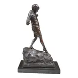 An early 20th century bronze figure of a boy by Lorna Adamson, 1913, bronze, sold Jan 2025