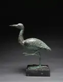 Heron Signed and dated John Behan 1918 by John Behan, Bronze with green patination on a black marble base, sold Dec 2022