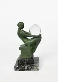 A verdi gris patinated sculptural lamp by Max Le Verrier, sculpture, sold Oct 2022