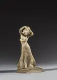 Jeune femme se coiffant by Louis Dejean, Terre cuite patinée et rehauts d'or, sold Jun 2024