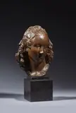 Masque de Coralie by Jean Osouf, Bronze à patine mordorée, sold Jun 2024