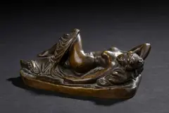Bayadère assoupie sur des coussins by James Pradier, Bronze à patine brune, sold Mar 2025