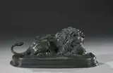Lion dévorant une biche by Antoine-Louis Barye, Bronze à patine verte, marque du fondeur: F BARBEDIENNE Fondeur, dédicacé à Monsieur André, sold Jun 2025