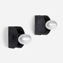 Sconces model 43, pair by Gino Sarfatti, 1963, crackle-lacquered aluminum, sold Mar 2023