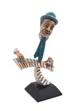 Legends" or "Piano Man" - 1994 by Paul Douglas Wegner, bronze, sold Oct 2025