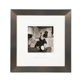 Marlon Brando; with Bongo Drums in the Den of His Beverly Glen House" - 1955 by Sid Avery, silver gelatin print, sold Oct 2025