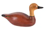 Ruddy shelduck, a carved and stained wood model of a shelduck by Guy Taplin, sculpture, sold Jul 2024