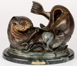 of an otter titled High Tide by Carole Danyluk, bronze, sold Feb 2024