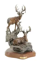 The Buck Stops Here by Dennis Jones, Patinated bronze sculpture mounted to a wooden plinth titled "The Buck Stops Here", sold Dec 2022