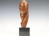 Mademoiselle Pogany III by Constantin Brancusi, Bronze sculpture of an abstract bust mounted to a granite plinth, sold Jun 2023