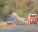 The Red Bus by Clarice Beckett, oil on canvas on compressed card, sold May 2022