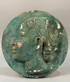 Portrait de femme malgache, de profil en bas-relief by Gabrielle Maurion-Vidal, Terre cuite à patine médaille (Manques, sold Jan 2024