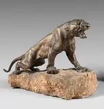 Panthère sur un rocher by Thomas François Cartier, Épreuve en bronze patiné sur un socle en pierre, sold May 2022