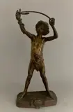Le charmeur by Leon Bureau, Épreuve en bronze à patine médaille signé sur la terrasse et titré dans un cuir découpé en, sold Feb 2025