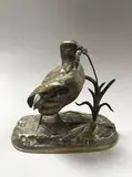 Perdrix à l'épi de blé by Jules Moigniez, Épreuve en bronze à patine dorée signée sur la terrasse, sold Dec 2024