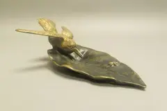 Vide-poche au colibri by Alfred Dubucand, Épreuve en bronze à double patine, sold May 2025