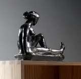 Jeune femme assise by Lucile Passavant, Épreuve en bronze patiné noir nuancé, sold Nov 2022
