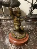 Ange de l'amour by Louis Kley, Bronze patiné sur socle en marbre griotte, sold Apr 2022