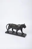 Tigre qui marche (sur plinthe) by Antoine-Louis Barye, Épreuve en bronze à patine brun vert, sold Nov 2024