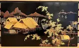 Pêcheurs dans un paysage lacustre, [19]52 by Thanh le Nguyen, Panneau à décor en laque du Vietnam, sold Feb 2024