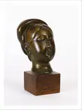 Tête de jeune femme, circa 1941 by Vũ Cao Đàm, Épreuve en bronze à patine marron doré, sold Jun 2019
