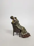 Femme assise à surprise by Franz Bergman, Epreuve en bronze à patine polychrome; la robe amovible dévoile le corps nu, sold Mar 2020
