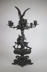 Candélabre décoré de groupes d'animaux by Antoine-Louis Barye, Epreuve en bronze à patine brun foncé nuancé, sold Jun 2018