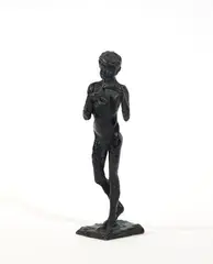 Homme nu jouant de la flûte by Michel Levy, Bronze à patine bleue nuancée, sold Dec 2025