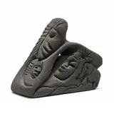 Sandstone Sculpture by Lonnie Holley, Carved black sandstone sculpture with several faces, sold Nov 2025