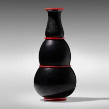 Rosso e Nero vase by Napoleone Martinuzzi, c. 1933, deep amethyst glass with silver leaf and red pasta di vetro applications, sold Mar 2023