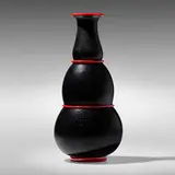 Rosso e Nero vase by Napoleone Martinuzzi, c. 1933, deep amethyst glass with silver leaf and red pasta di vetro applications, sold Mar 2023
