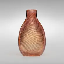 Mezza Filigrana bottle, model 656 by Carlo Scarpa, c. 1936, glass with red filigree, sold Mar 2023