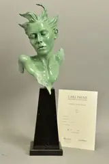 Odile by Carl Payne, Bronze sculpture of a female face, mounted to a black Granite base, sold Apr 2022