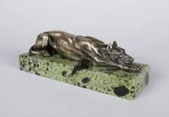 Chien danois couché by Édouard-Marcel Sandoz, Epreuve en bronze à patine argentée, sold Jun 2018