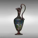 Screziato ewer by Salviati & C., c. 1878, polychrome glass with gold inclusions and applied handle, sold Mar 2023