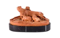 A terracotta group of a dog with her three young puppies by Joseph Gott, sculpture, sold Jun 2024