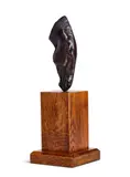 Maquette for still water by Nic Fiddian-Green, Bronze, set on an oak base, sold Apr 2024
