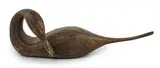 A carved and painted wood figure of a pintail duck with glass inset by Guy Taplin, sculpture, sold Jun 2024